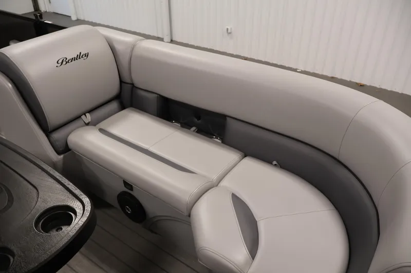 Slide: The Image of 2025 Bentley Pontoons 223 Swingback interior with luxurious gray seating. - 12