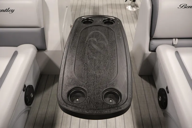 Slide: The Image of Interior of 2025 Bentley Pontoons 223 Swingback with sleek table and cup holders. - 17