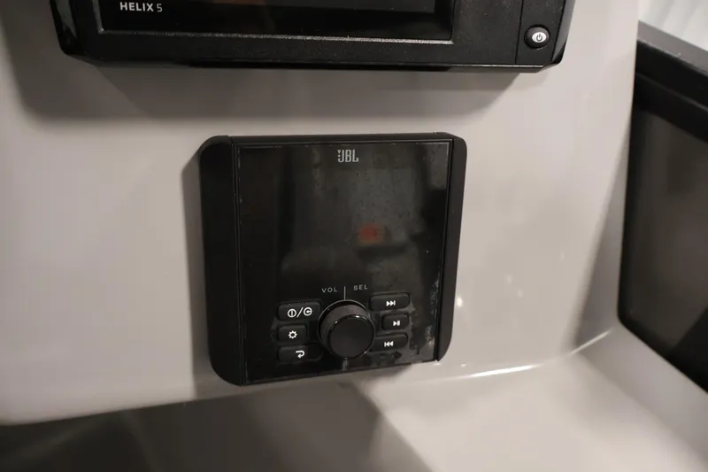 Slide: The Image of JBL audio system in 2025 Bentley Pontoons 223 Swingback boat dashboard. - 26