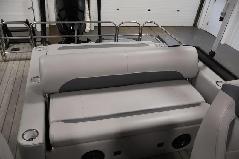 Slide: The Image of 2025 Bentley Pontoons 223 Swingback interior with sleek seating and cup holders. - 31