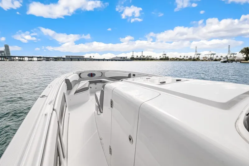 Slide: The Image of Cigarette 41' GTR 2015 boat on calm water under blue sky. - 13