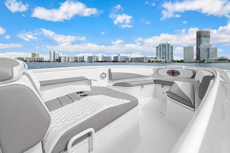 Slide: The Image of Luxurious interior of 2015 Cigarette 41' GTR yacht with city skyline. - 15