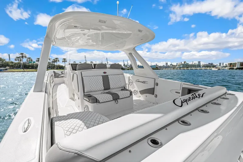 Slide: The Image of Luxurious 2015 Cigarette 41' GTR boat on open water. - 16