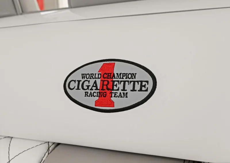 Slide: The Image of Cigarette 41' GTR 2015 logo on white background. - 22