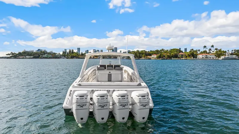 Slide: The Image of 2015 Cigarette 41' GTR boat on open water with four engines. - 6