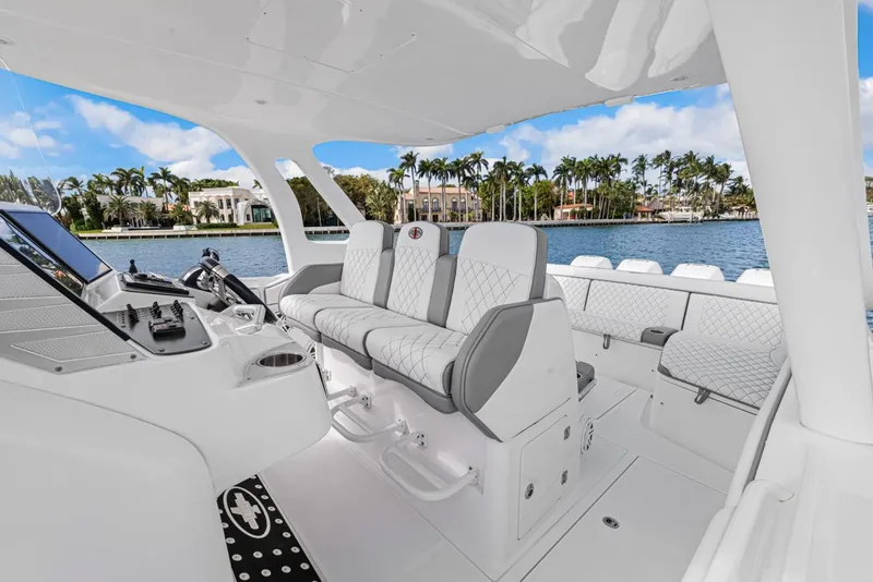 Slide: The Image of Luxurious interior of Cigarette 41' GTR yacht, 2015 model, featuring elegant seating. - 8