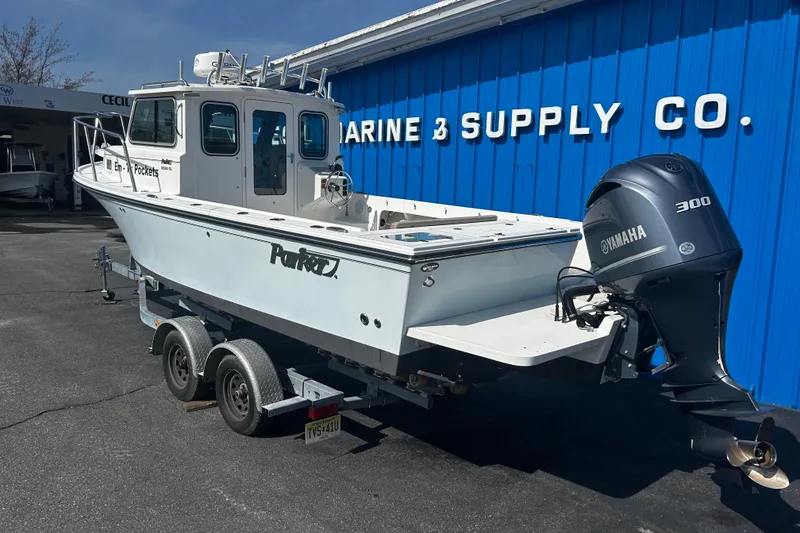 Slide: The Image of 2019 Parker 2320 Sport Cabin boat with Yamaha 300 engine at Marine Supply Co. - 2