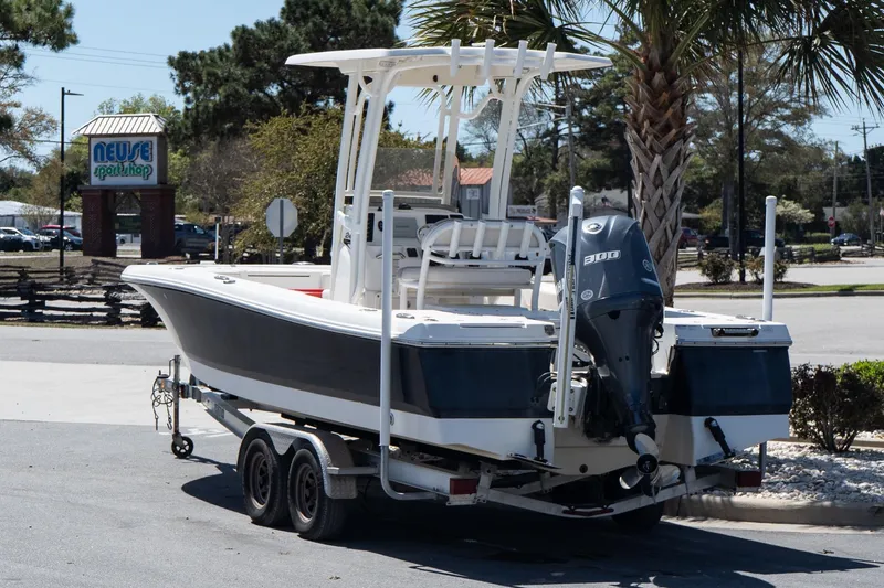 Slide: The Image of 2017 Robalo 246 Cayman boat on trailer near Neuse Sport Shop. - 4