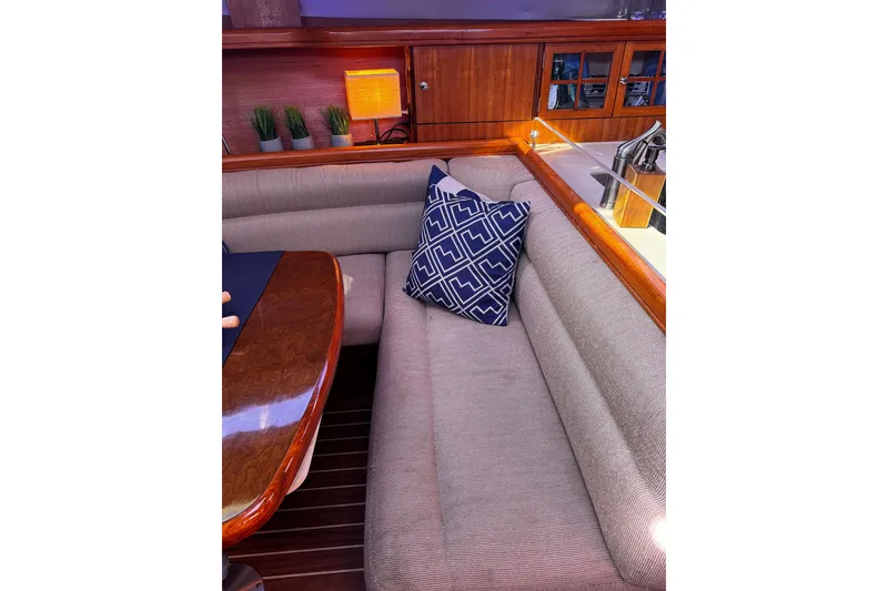 Slide: The Image of Cozy interior of 2007 Hunter 38 yacht with elegant seating and decor. - 27