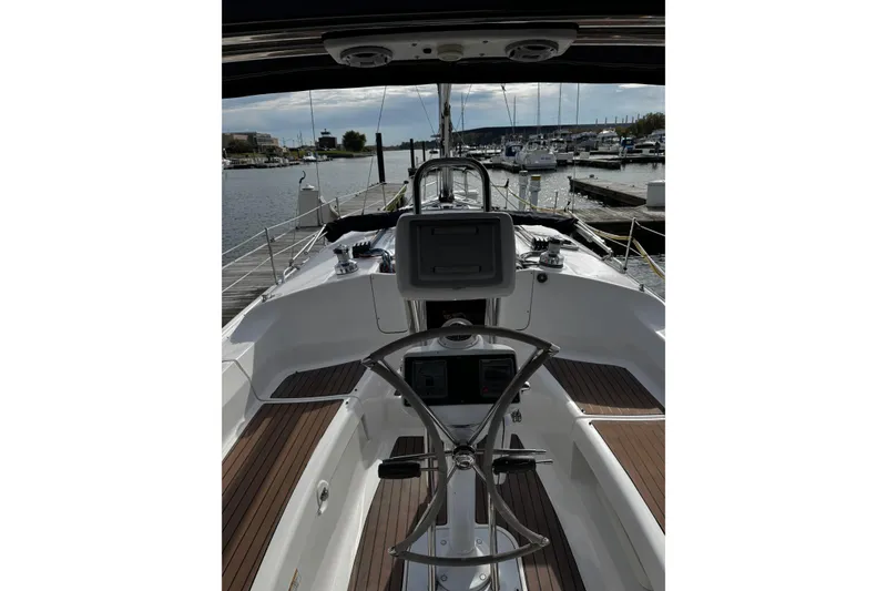 Slide: The Image of Cockpit view of 2007 Hunter 38 sailboat docked at marina. - 8