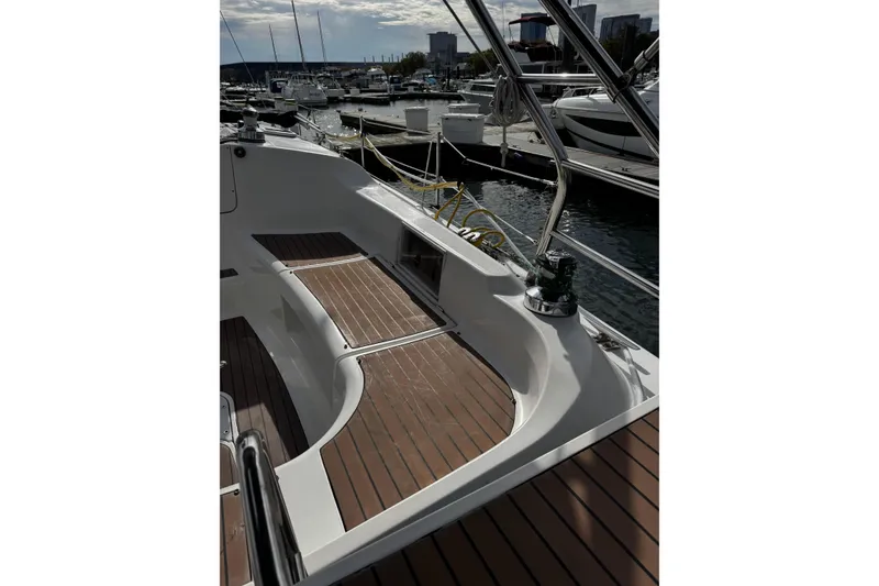 Slide: The Image of Hunter 38 sailboat deck, 2007 model, docked at marina with wooden flooring. - 9