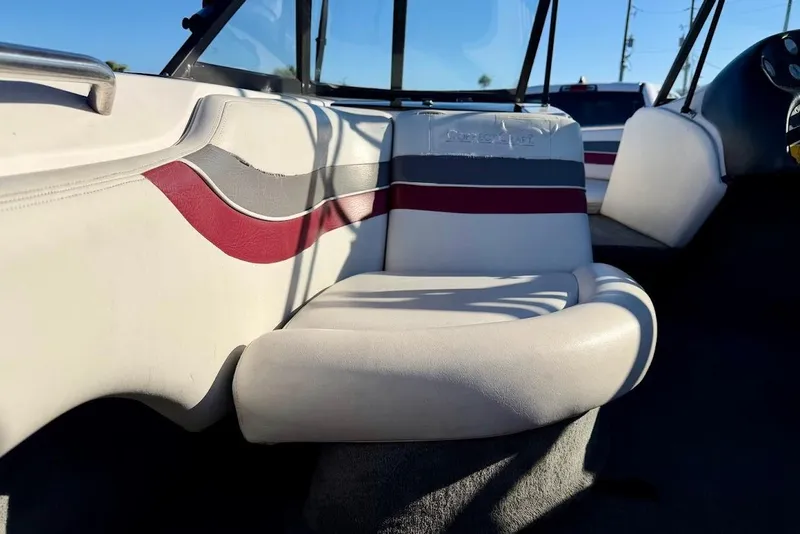 Slide: The Image of 1993 Nautique Sport Nautique 200 boat interior with white and red seating. - 14