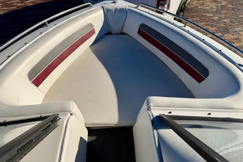 Slide: The Image of 1993 Nautique Sport Nautique 200 boat interior with white and red seating. - 17