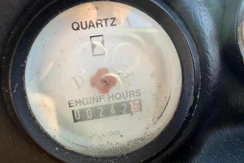 Slide: The Image of Close-up of a 1993 Nautique Sport Nautique 200 engine hour meter showing 2425 hours. - 21