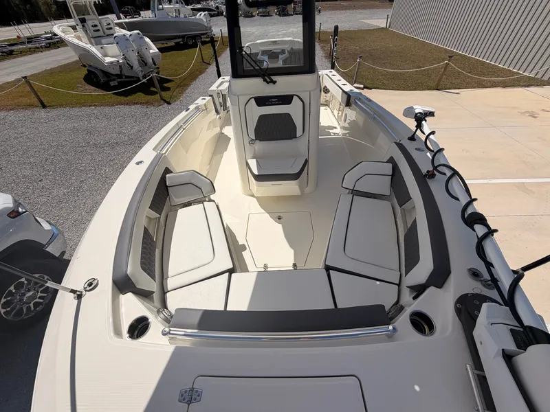 Slide: The Image of Interior view of 2026 Cobia 245CC boat with seating area. - 10