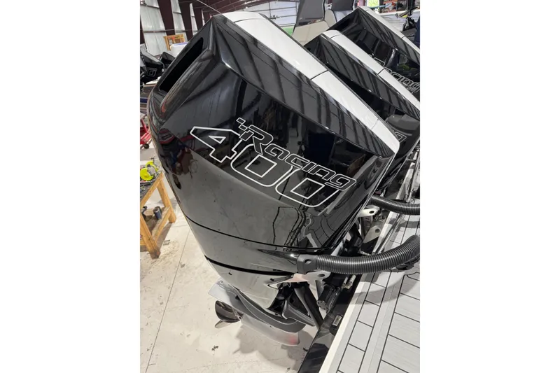 Slide: The Image of 2026 Nor-Tech 390 Sport Center Console with powerful Racing 400 outboard engines. - 13