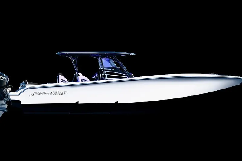 Slide: The Image of 2026 Nor-Tech 390 Sport Center Console boat, sleek design, side view on black background. - 19