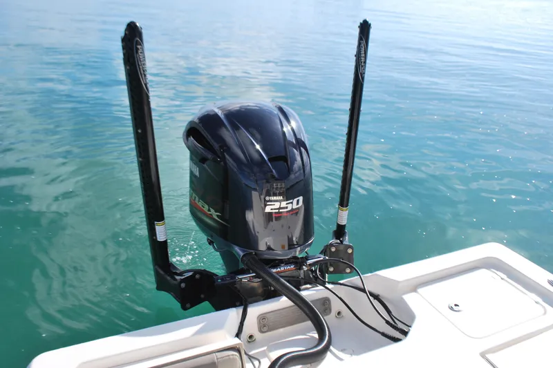 Slide: The Image of 2021 Key West 210 Bay Reef boat with Yamaha 250 engine on calm water. - 16