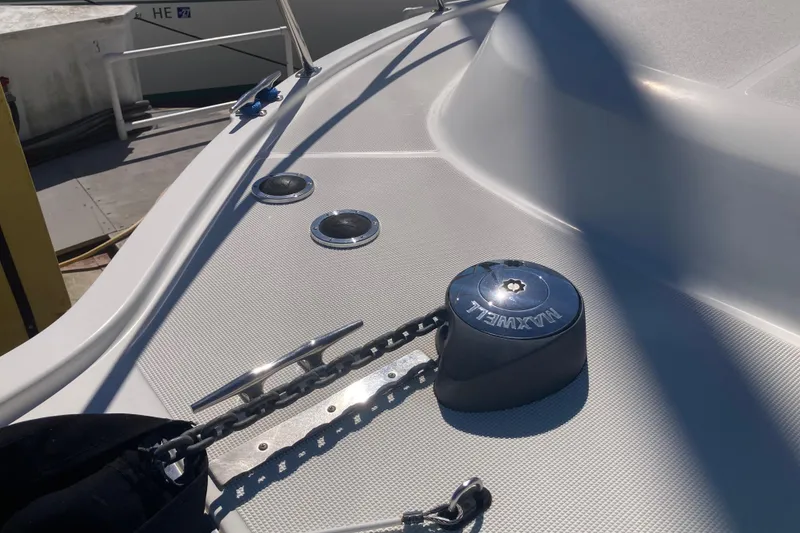 Slide: The Image of Bow deck of 2002 Tiara Yachts 2900 Open with anchor chain and Maxwell windlass. - 19