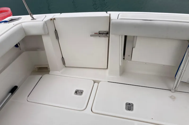 Slide: The Image of 2002 Tiara Yachts 2900 Open boat deck with storage compartments and seating. - 37