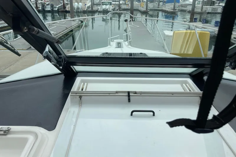 Slide: The Image of 2002 Tiara Yachts 2900 Open at marina, view from cockpit towards bow. - 55