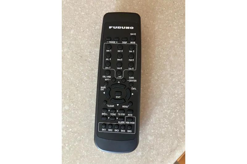 Slide: The Image of Remote control for Furuno marine electronics on a 2002 Tiara Yachts 2900 Open. - 69
