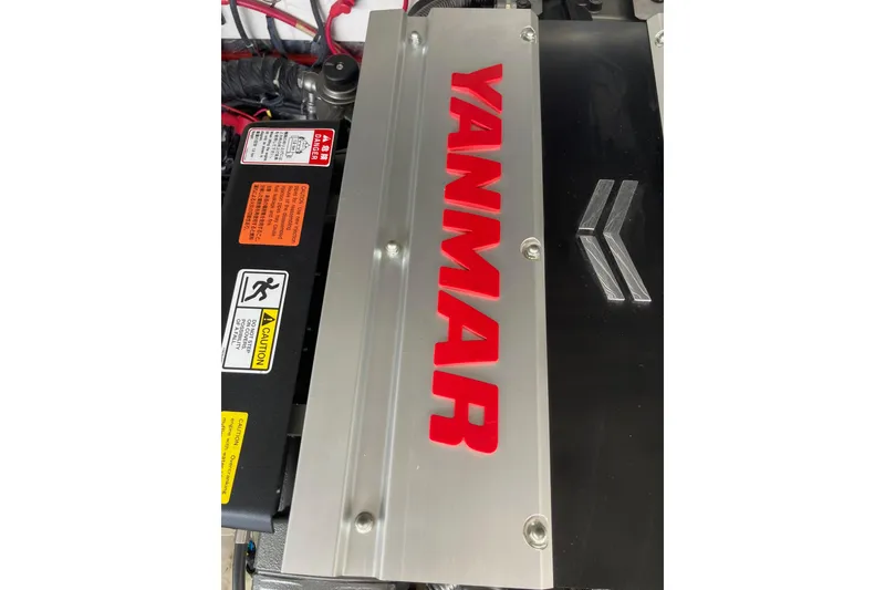 Slide: The Image of Engine compartment of a 2002 Tiara Yachts 2900 Open with Yanmar branding. - 72