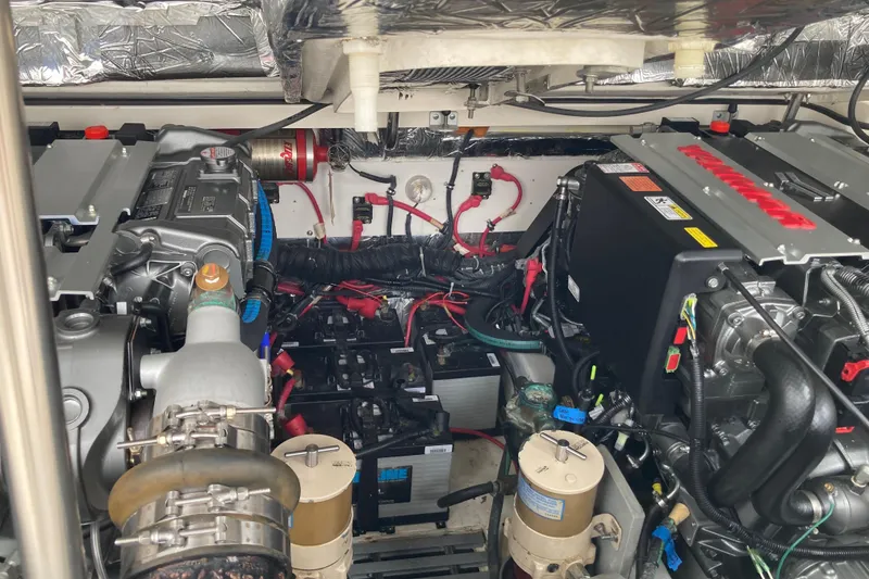 Slide: The Image of Engine compartment of a 2002 Tiara Yachts 2900 Open, showcasing mechanical components. - 73