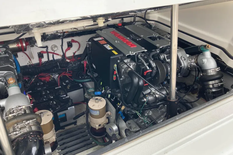 Slide: The Image of Engine compartment of a 2002 Tiara Yachts 2900 Open, showcasing detailed mechanical components. - 74