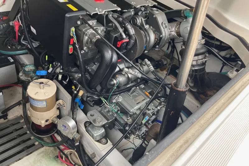 Slide: The Image of Engine compartment of a 2002 Tiara Yachts 2900 Open, showcasing mechanical components. - 75