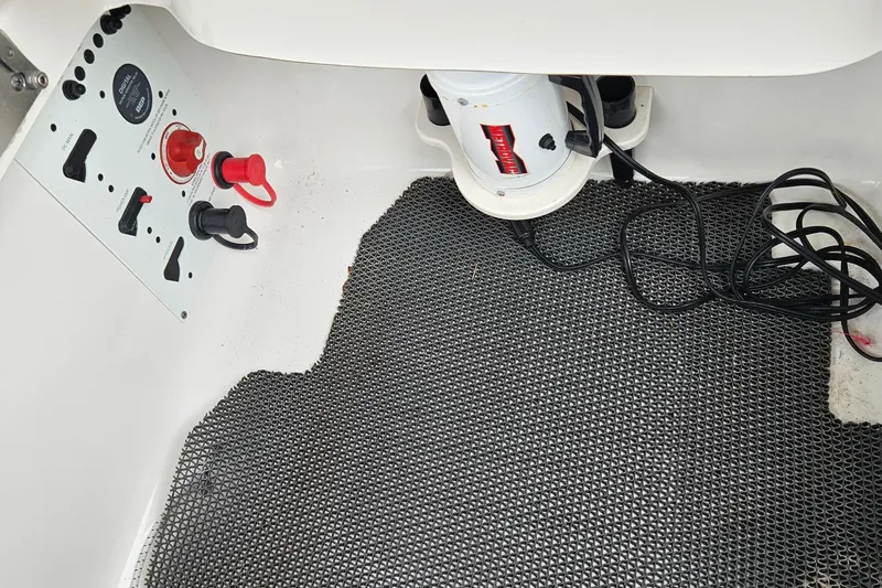 Slide: The Image of 2018 Chaparral 257 SSX boat interior with control panel and wiring. - 20