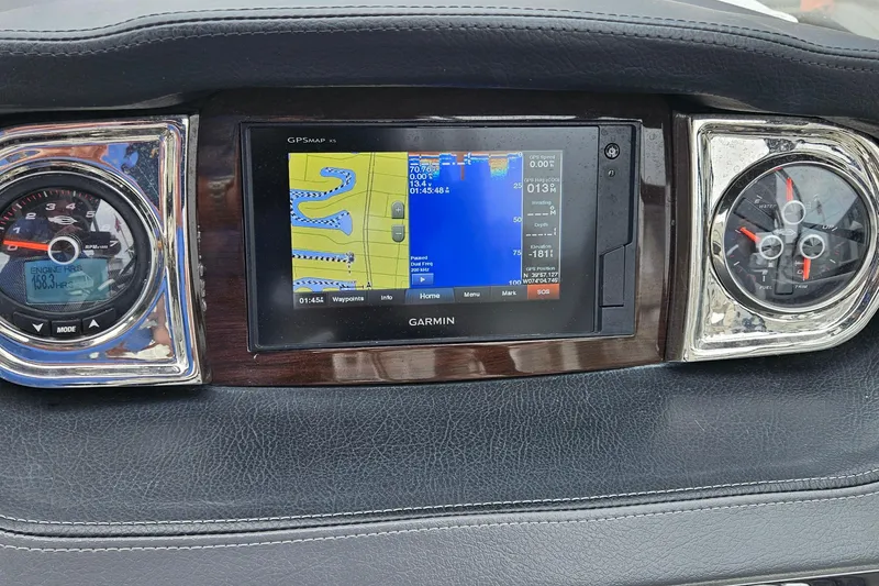 Slide: The Image of Dashboard of 2018 Chaparral 257 SSX with Garmin GPS and gauges. - 4