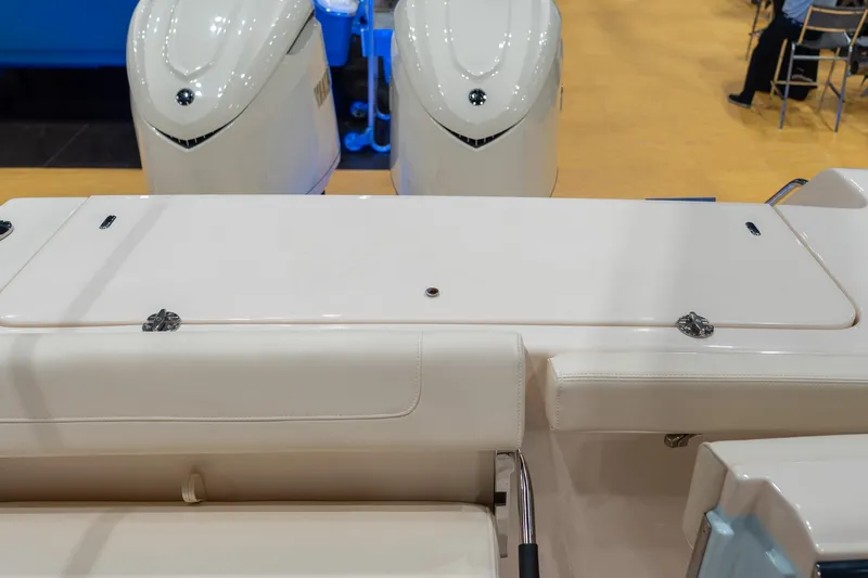 Slide: The Image of 2026 Grady-White Canyon 306 boat with dual engines and sleek seating area. - 15
