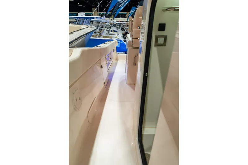 Slide: The Image of 2026 Grady-White Canyon 306 boat interior, showcasing sleek design and modern features. - 26