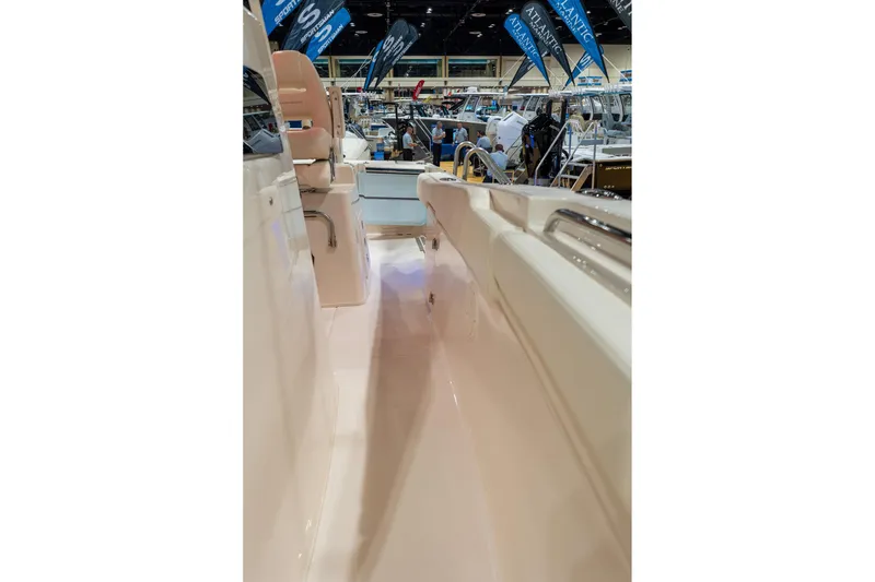 Slide: The Image of 2026 Grady-White Canyon 306 boat interior at a boat show. - 27