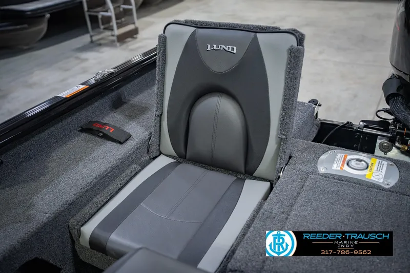 Slide: The Image of 2026 Lund 1775 Impact XS boat seat, gray upholstery, Reeder-Trausch Marine logo visible. - 20