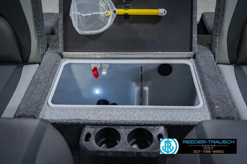 Slide: The Image of 2026 Lund 1775 Impact XS boat interior with storage compartment and fishing net. - 24