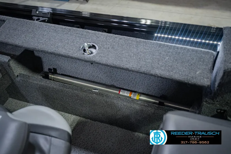 Slide: The Image of Interior view of 2026 Lund 1775 Impact XS boat storage compartment. - 26