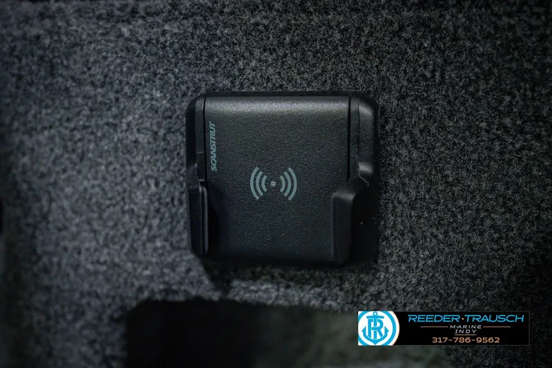 Slide: The Image of Wireless charging pad in 2026 Lund 1775 Impact XS boat interior. - 38