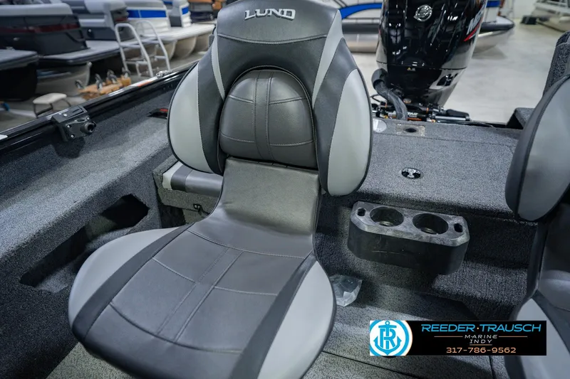 Slide: The Image of 2026 Lund 1775 Impact XS boat seat with cup holders, showcased at Reeder Trausch Marine. - 45