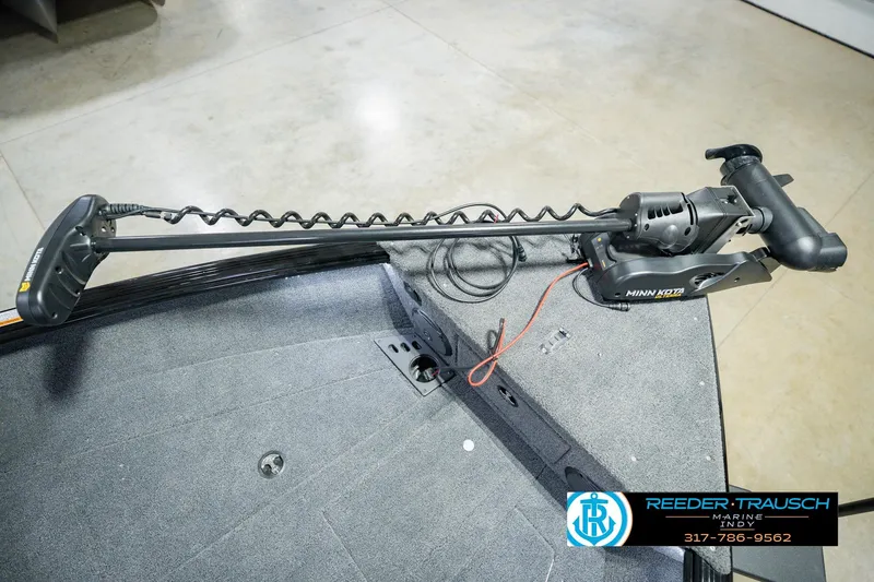 Slide: The Image of 2026 Lund 1775 Impact XS boat with Minn Kota trolling motor on deck. - 55