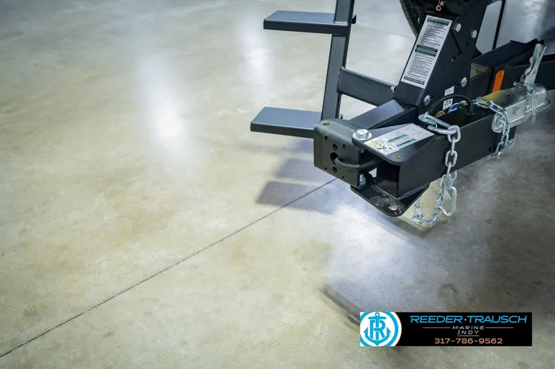 Slide: The Image of Trailer hitch of 2026 Lund 1775 Impact XS on polished concrete floor. - 62