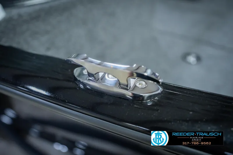 Slide: The Image of 2026 Lund 1775 Impact XS boat cleat detail, featuring sleek chrome finish. - 66