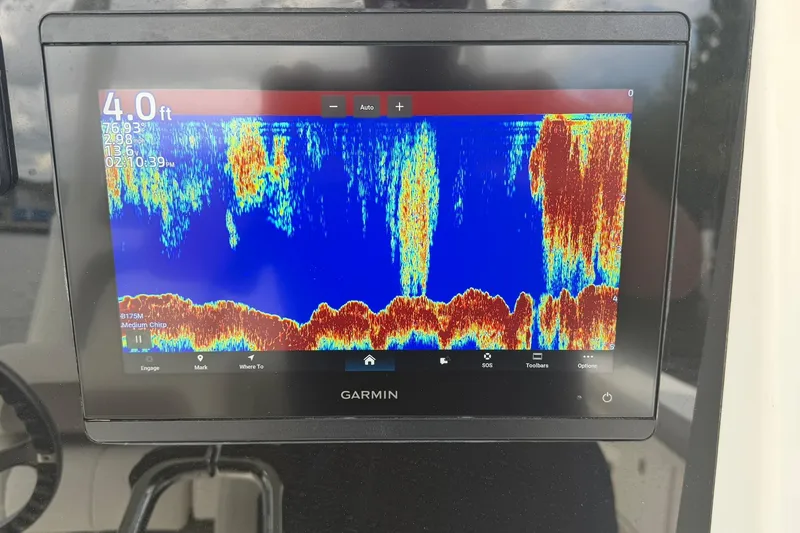 Slide: The Image of Garmin sonar display on 2020 World Cat 295 CC boat, showing underwater depth and terrain. - 19