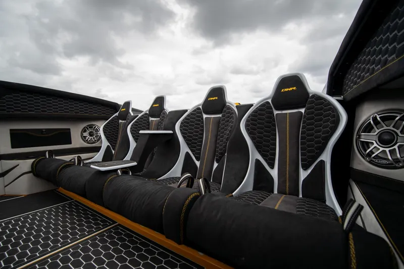 Slide: The Image of Luxurious interior of 2026 Doug Wright 36 boat with sleek black and white seating. - 11