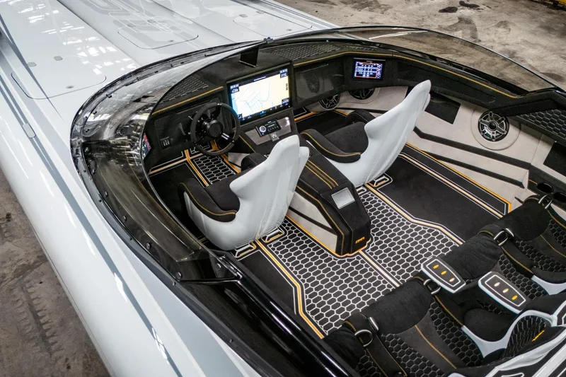Slide: The Image of Interior of a 2026 Doug Wright 36 boat, featuring sleek design and advanced navigation systems. - 5