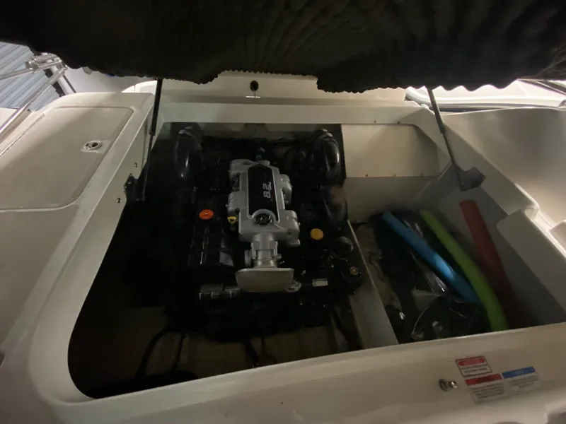 Slide: The Image of Engine compartment of a 2010 Sea Ray 280 Sundeck boat. - 13