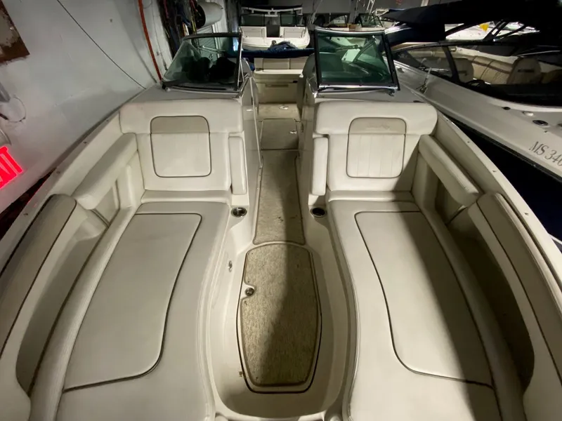 Slide: The Image of Interior of a 2010 Sea Ray 280 Sundeck boat with seating. - 9