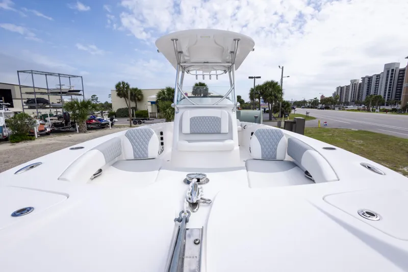 Slide: The Image of 2022 Twin Vee 240 GFX CC boat with spacious seating and modern design. - 11