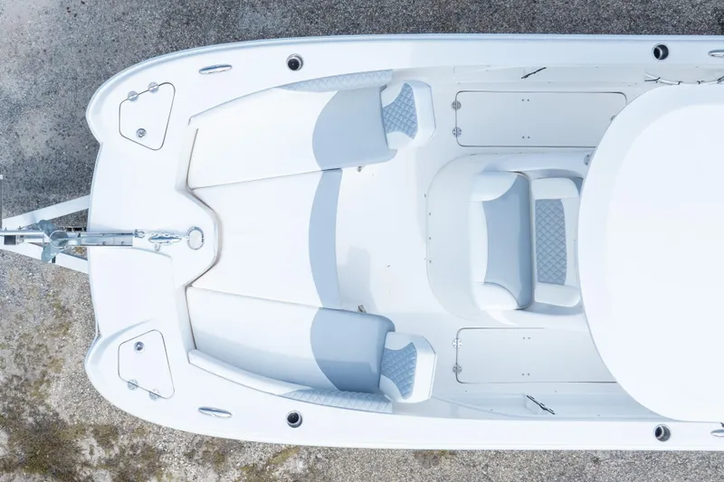 Slide: The Image of Overhead view of 2022 Twin Vee 240 GFX CC boat interior, featuring seating and storage. - 44